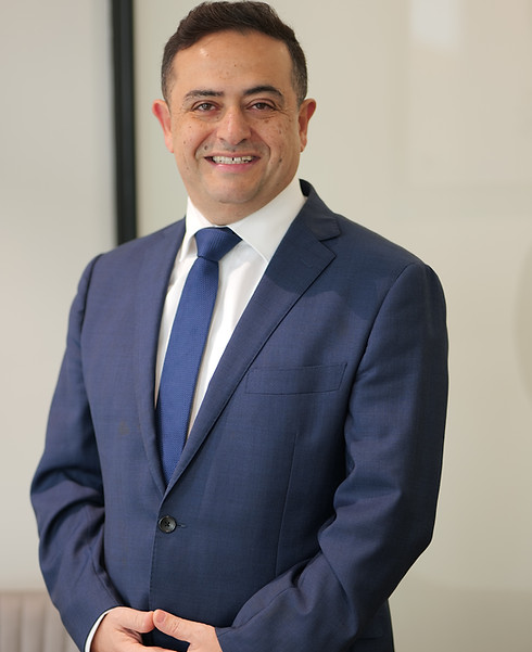 Solicitor reviewing case law at PW & Associates